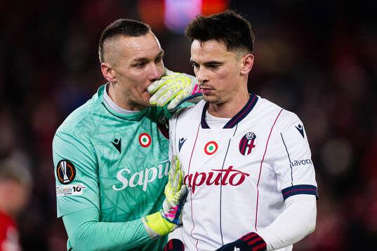 Goalkeeper Łukasz Skorupski and Nikola Moro of Bologna