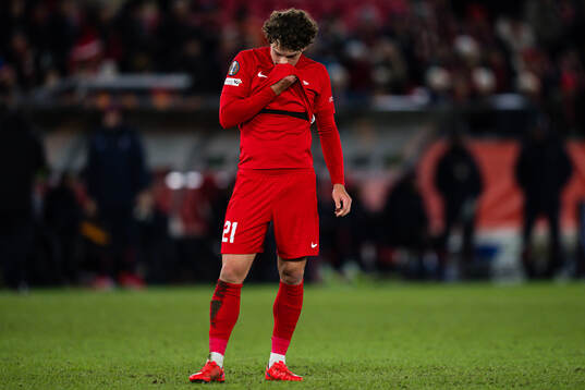 Denzel De Roeve of Brann looks dejected