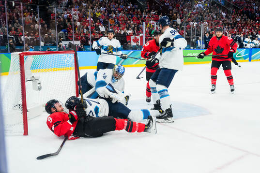Sam Bennett of Canada against Niko Mikkola and goaltender