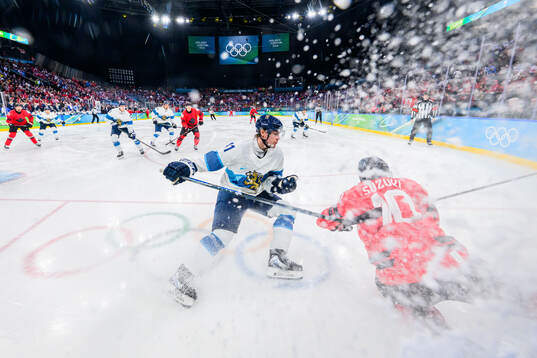 Miro Heiskanen of Finland and Nick Suzuki of Canada in the
