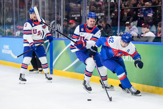 Brady Tkachuk of USA and Martin Fehervary of Slovakia in