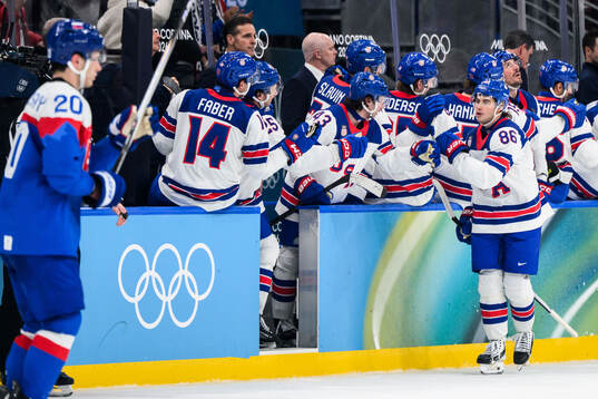 Jack Hughes of USA celebrates