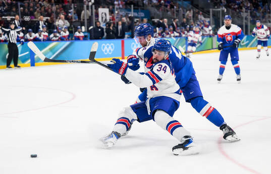 Auston Matthews of USA and Martin Gernat of Slovakia in the