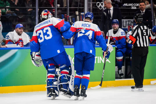 Goaltender Stanislav Skorvanek and Patrik Koch of Slovakia
