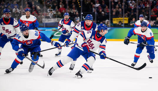 Pavol Regenda of Slovakia and Jake Sanderson of USA in the
