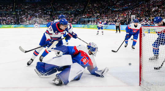Tage Thompson of USA against goaltender Samuel Hlavaj of