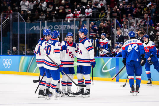 Jack Hughes of USA celebrates