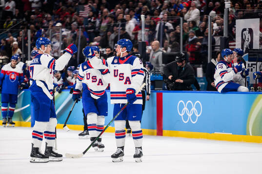 Brady Tkachuk and Jack Eichel of USA celebrate