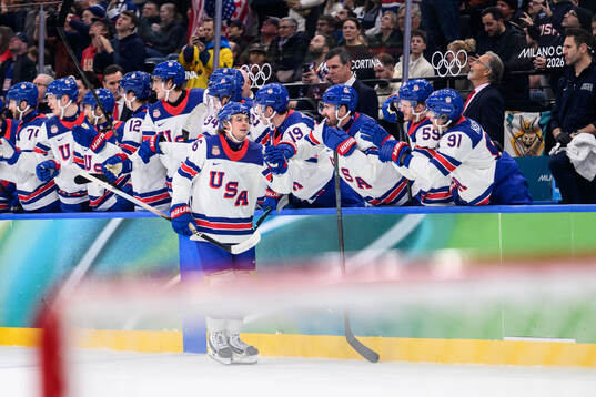 Jack Hughes of USA celebrates