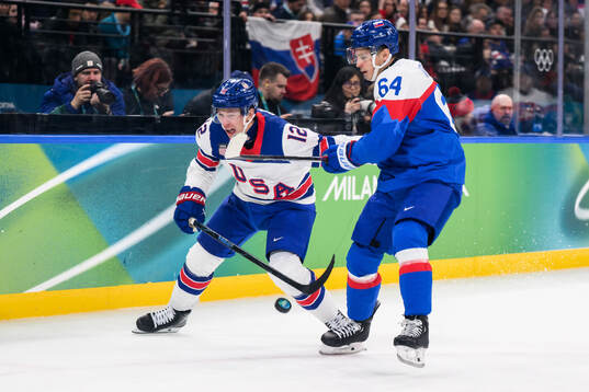 Matt Boldy of USA and Patrik Koch of Slovakia in the men's