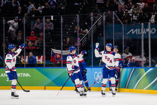 Jack Eichel and Brady Tkachuk of USA celebrate