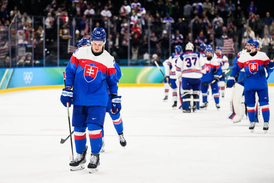 Juraj Slafkovsky of Slovakia looks dejected