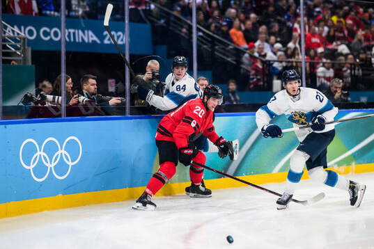 Thomas Harley of Canada against Kaapo Kakko and Eetu