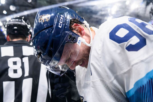 Mikko Rantanen of Finland looks dejected in the men's ice