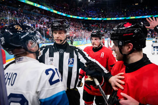 Sebastian Aho of Finland and Cale Makar and Devon Toews of