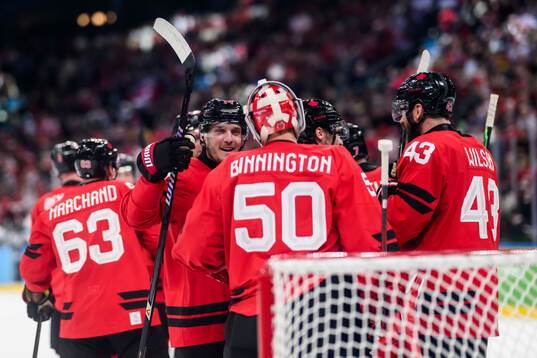 Bo Horvat and goaltender Jordan Binnington of Canada