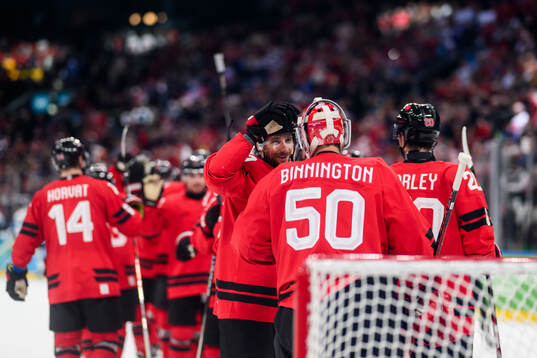 Shea Theodore and goaltender Jordan Binnington of Canada