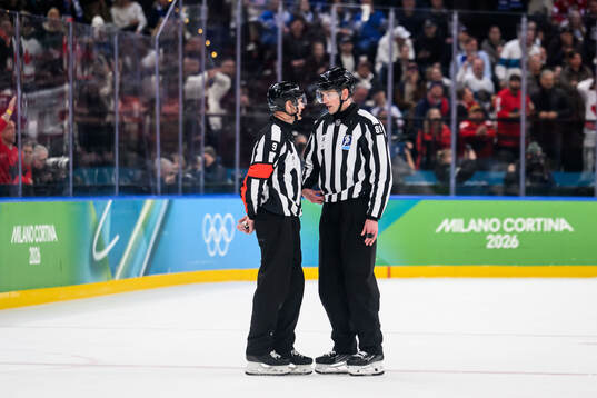 Referee Dan O'Rourke and linesman Ryan Daisy in the men's