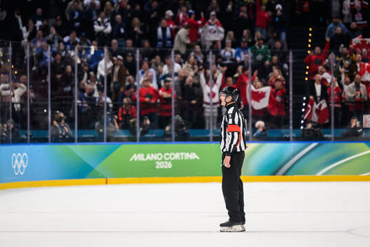 Referee Dan O'Rourke in the men's ice hockey semifinal