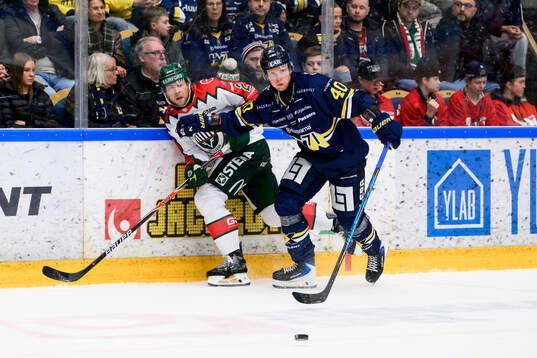 HV71s Oskar Stål-Lyrenäs och Frölundas Christian Folin