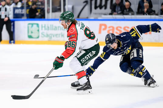 Frölundas Erik Thorell och HV71s Riley Woods