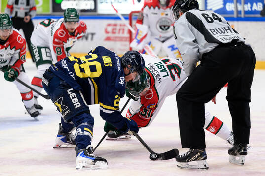 HV71s Justin Glenn Kloos och Frölundas Nicklas Lasu