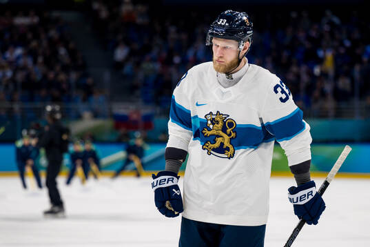 Nikolas Matinpalo of Finland n the men's ice hockey bronze