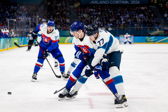 Juraj Slafkovsky of Slovakia and Niko Mikkola of Finland in