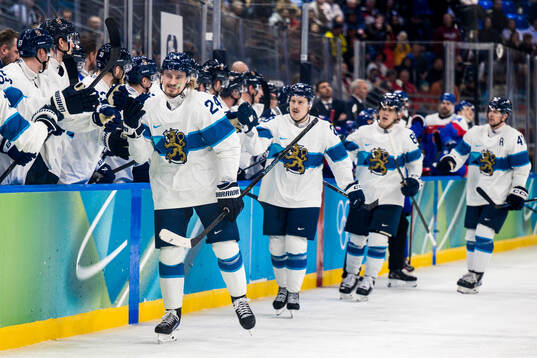 Roope Hintz of Finland celebrates scoring 1-3 in the men's