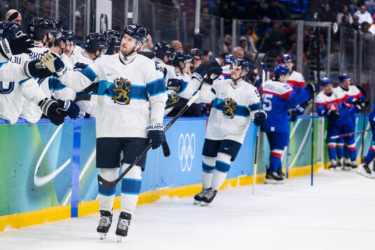 Joel Armia of Finland celebrates scoring 1-5 in the men's