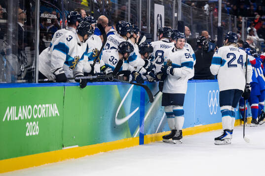 Erik Haula of Finland celebrates scoring 1-6 in the men's