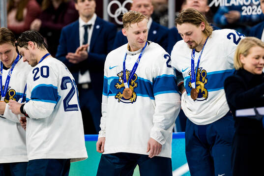 Esa Lindell and Roope Hintz of Finland with their bronze