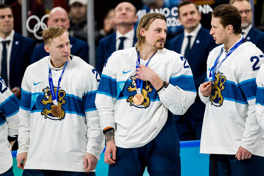 Esa Lindell, Roope Hintz and Eetu Luostarinen of Finland