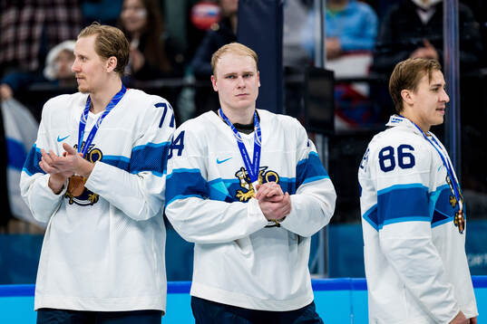 N Niko Mikkola and Kaapo Kakko of Finland with their bronze