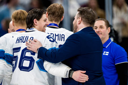 Erik Haula and Head coach Antti Pennanen of Finland