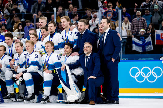 Head coach Antti Pennanen of Finland celebrate with their
