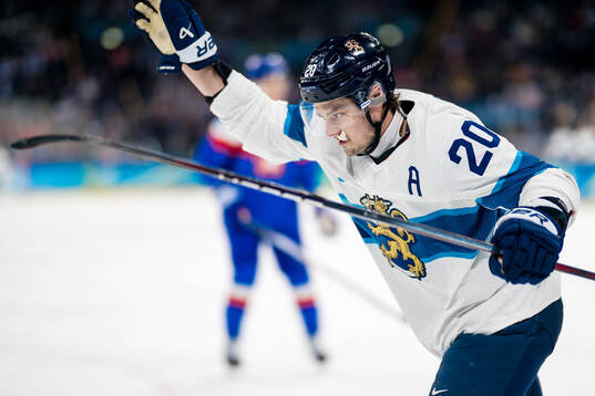Sebastian Aho of Finland celebrates scoring 0-1  in the