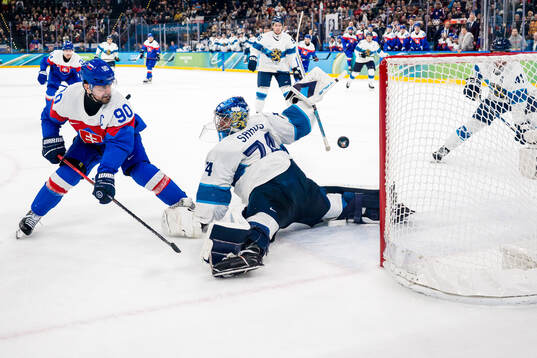 Tomas Tatar of Slovakia scores 1-2 behind goaltender Juuse