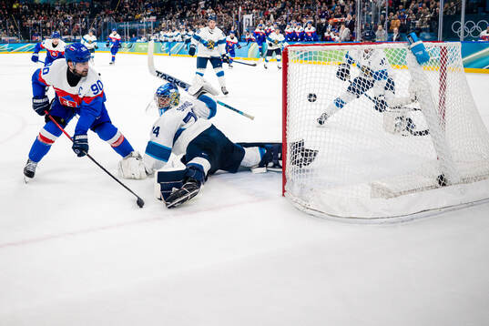 Tomas Tatar of Slovakia scores 1-2 behind goaltender Juuse