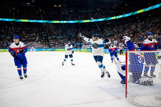 Roope Hintz of Finland celebrates scoring 1-3 in the men's