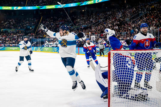 Roope Hintz of Finland celebrates scoring 1-3 in the men's