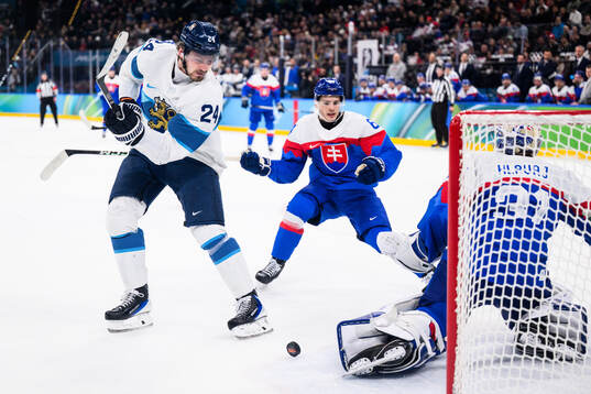 Roope Hintz of Finland and goaltender Samuel Hlavaj of