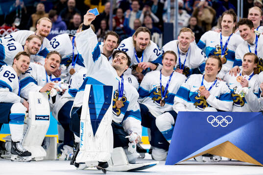 Goaltender Juuse Saros of Finland celebrate with their
