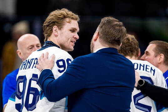 Mikko Rantanen and Head coach Antti Pennanen of Finland