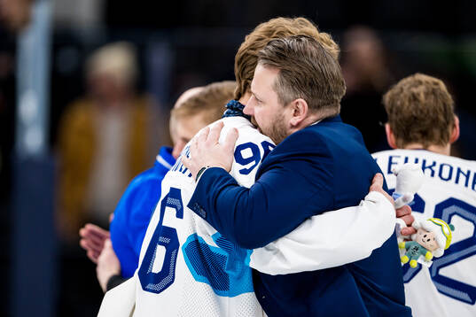 Mikko Rantanen and Head coach Antti Pennanen of Finland