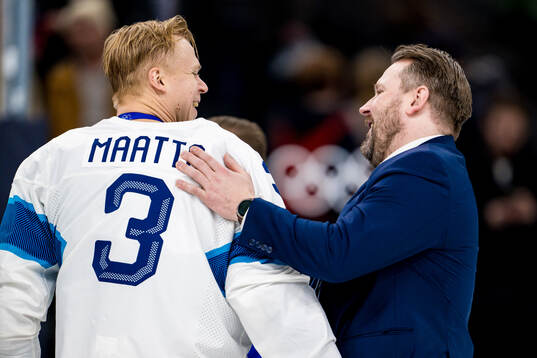 Olli Määttä and Head coach Antti Pennanen of Finland