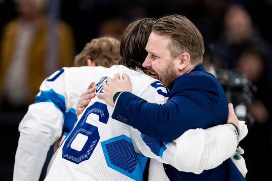 Erik Haula and Head coach Antti Pennanen of Finland