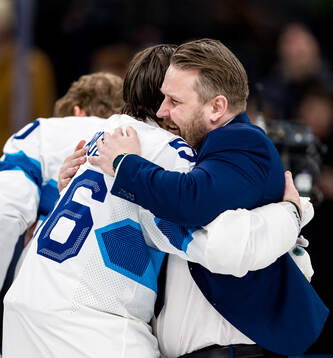 Erik Haula and Head coach Antti Pennanen of Finland