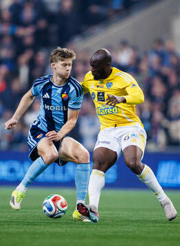 Djurgårdens Patric Åslund och Falkenbergs Lassina Sangaré