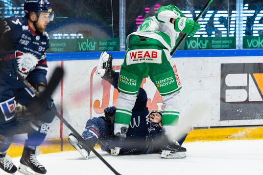 Linköpings Eskild Bakke Olsen och Rögles Paul Ladue